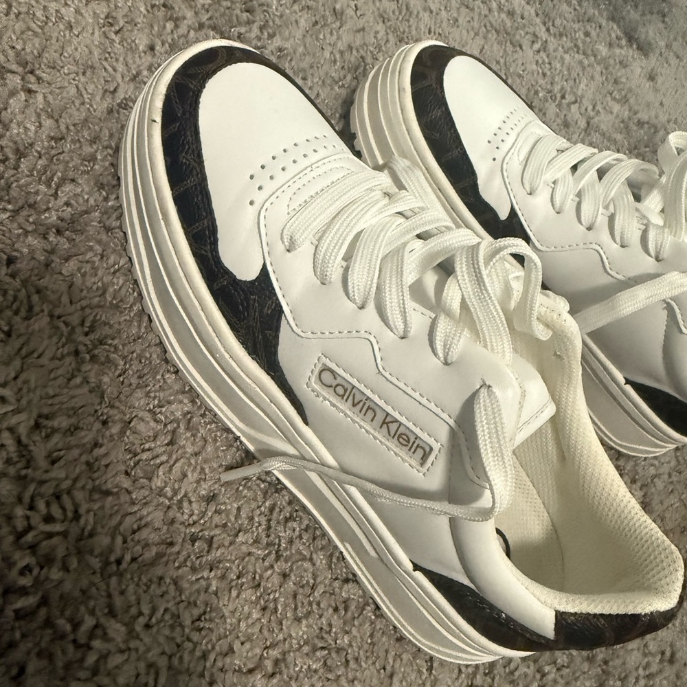 Calvin Klein White Sneakers with Black Details use couple of times but great c.